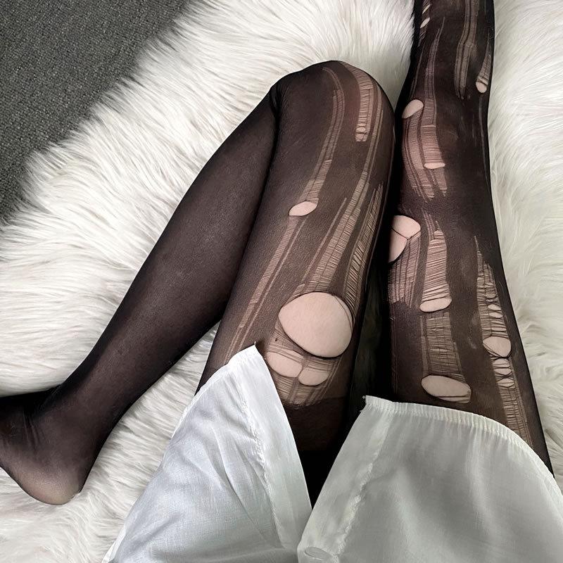 Hand ripped sheer mesh tights