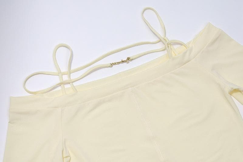 Long sleeve solid metal tag off shoulder top